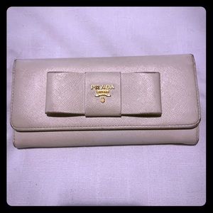 Genuine Prada bow tie wallet with authentication